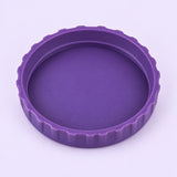 One purple lid, interior-up studio view on pale lavender.