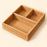Rectangular three-compartment wicker tray; 26 x 19 x 6 cm, contents not included.