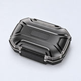 Smoky translucent black rectangular case with sculpted lid and front clasp.