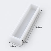 A white rectangular tray or mold shown on a light gray background with dimension arrows and labels indicating 10.8 cm length, 2.