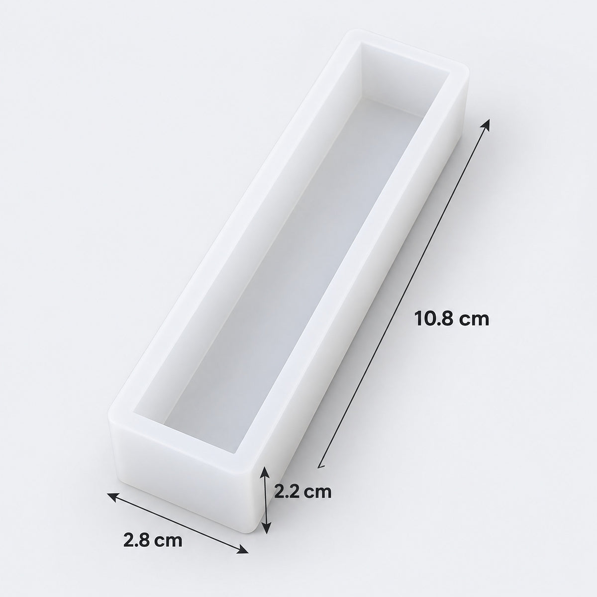 A white rectangular tray or mold shown on a light gray background with dimension arrows and labels indicating 10.8 cm length, 2.