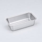 Empty silver aluminum loaf pan, 13.8 x 8 x 3.8 cm.
