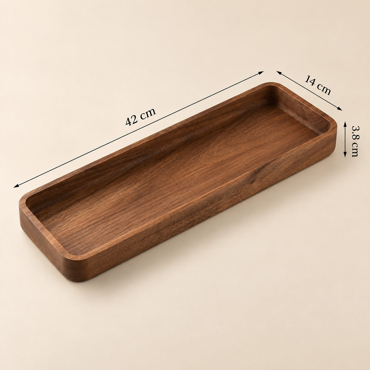 A rectangular wooden tray with rounded corners and raised edges, shown on a light beige background with dimension arrows and labels indicating 42 cm length, 14 cm width, and 3.8 cm height.