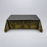 black with gold dots disposable plastic table cover style.