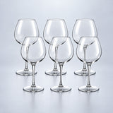 Burgundy set of 6: 6 empty clear stemmed Tritan wine cups on a pale gray studio background.