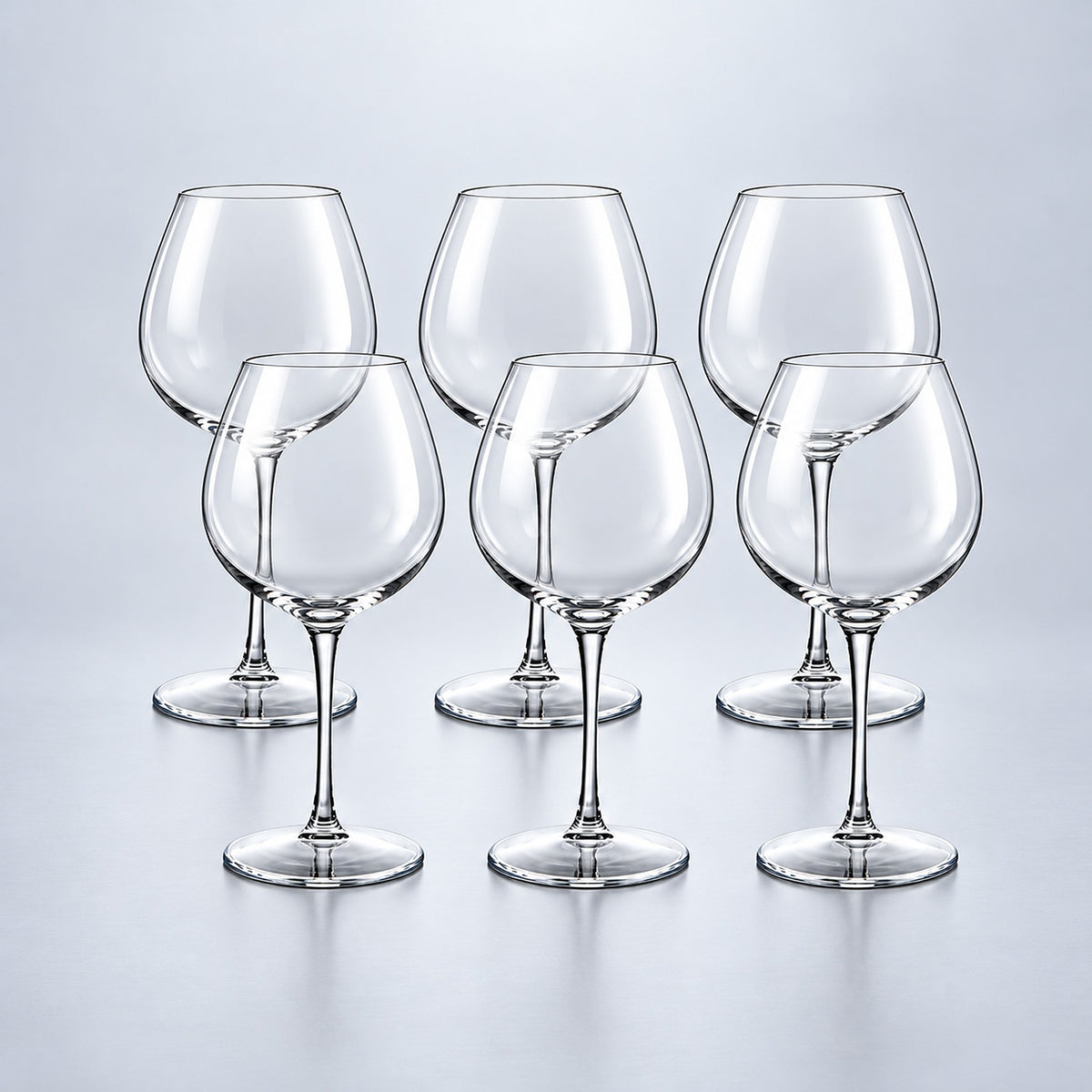Burgundy set of 6: 6 empty clear stemmed Tritan wine cups on a pale gray studio background.
