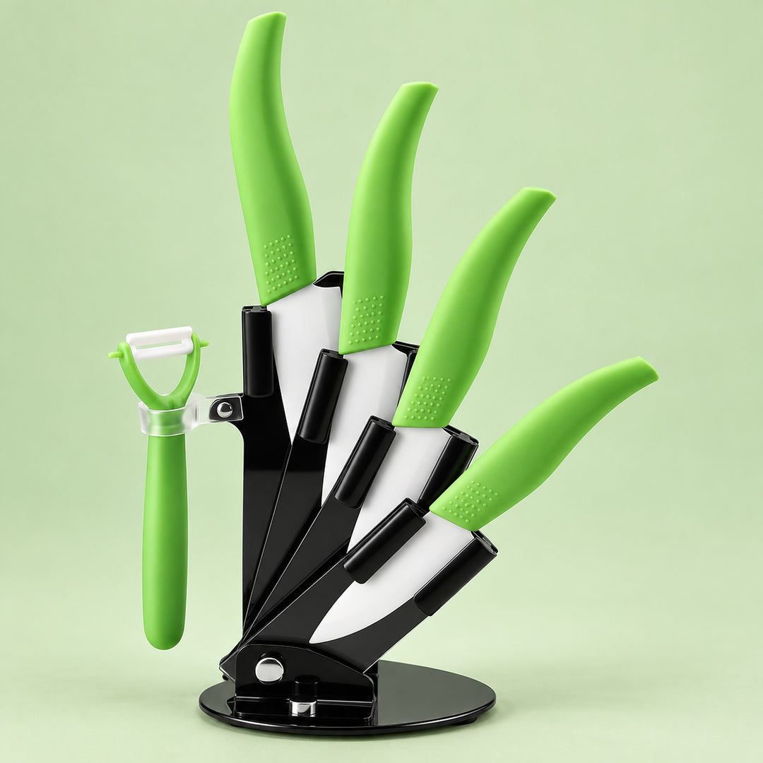 A kitchen utensil set with bright green handles, including four knives and a peeler, displayed on a black stand against a pale green background.