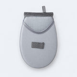 One rounded garment-steaming pad with mesh hand pocket.