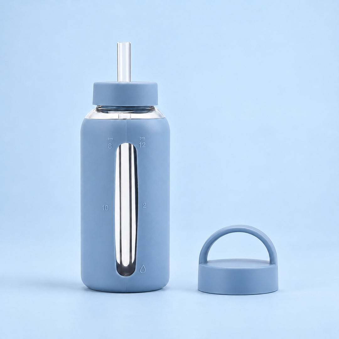 Sky Blue 800 ml glass bottle with silicone sleeve, wide straw and spare loop lid.