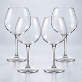 Burgundy set of 4: 4 empty clear stemmed Tritan wine cups on a pale gray studio background.