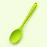 One lime green medium silicone spoon, 20.8 x 4.2 cm.