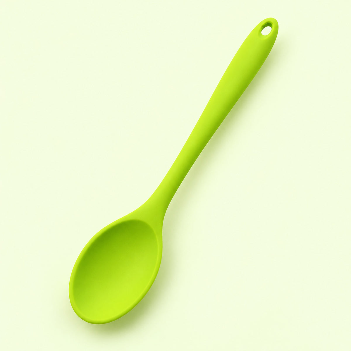 One lime green medium silicone spoon, 20.8 x 4.2 cm.