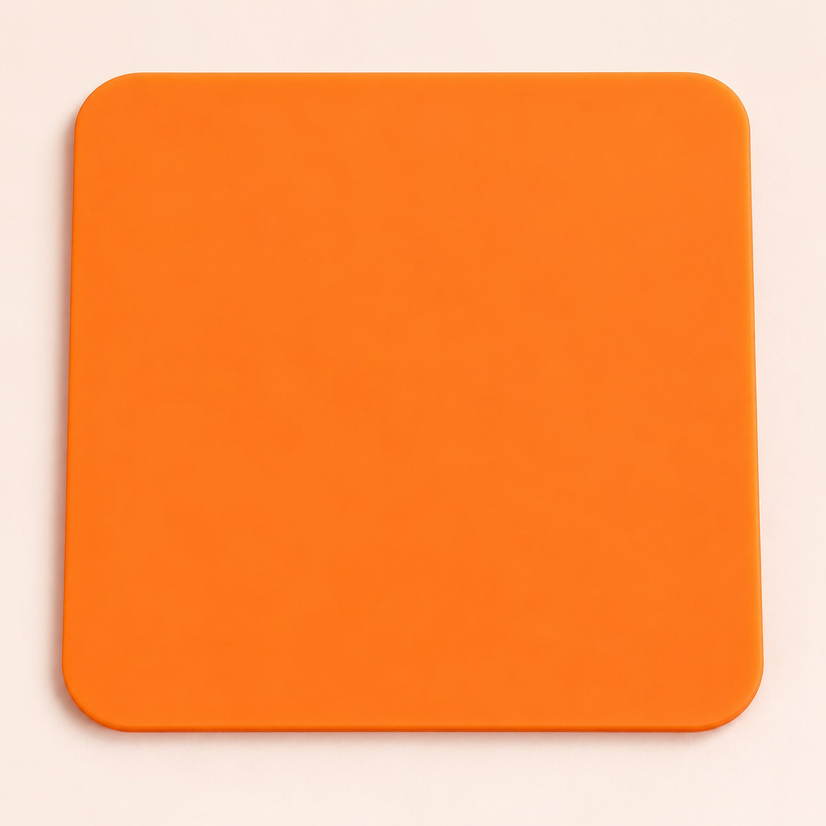 One orange square silicone coaster, 10 x 10 cm.