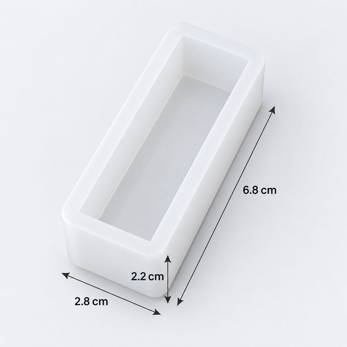 A white rectangular mold or tray with dimension annotations showing 6.8 cm height, 2.