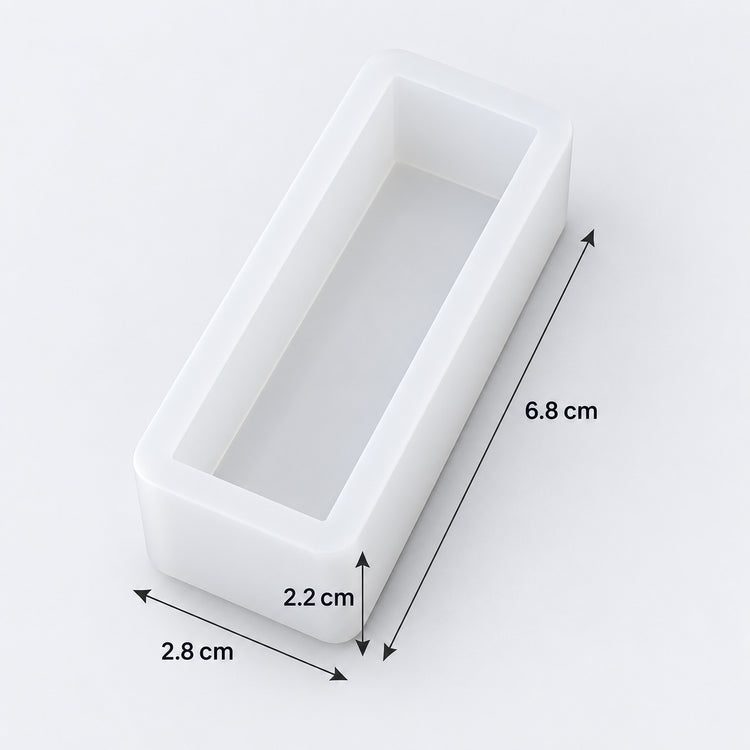 A white rectangular mold or tray with dimension annotations showing 6.8 cm height, 2.