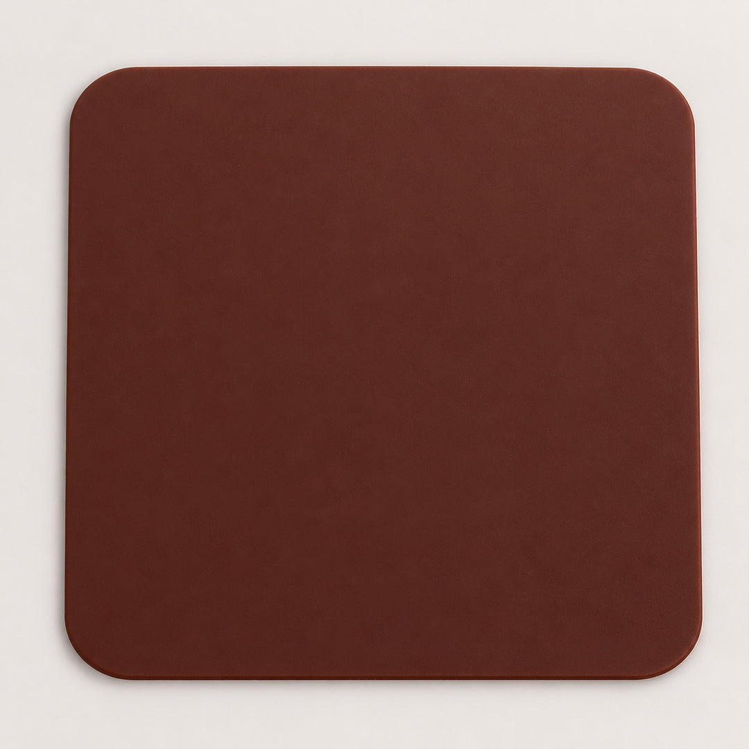 One brown square silicone coaster, 10 x 10 cm.