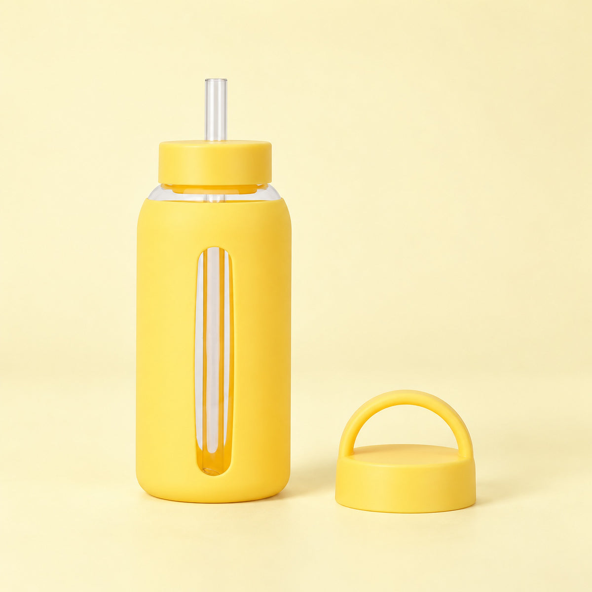Lemon Yellow 800 ml glass bottle with silicone sleeve, wide straw and spare loop lid.