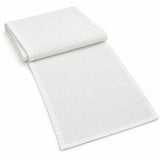 White cotton table runner with sewn edges, folded studio view; choose length separately.