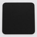 One black square silicone coaster, 10 x 10 cm.