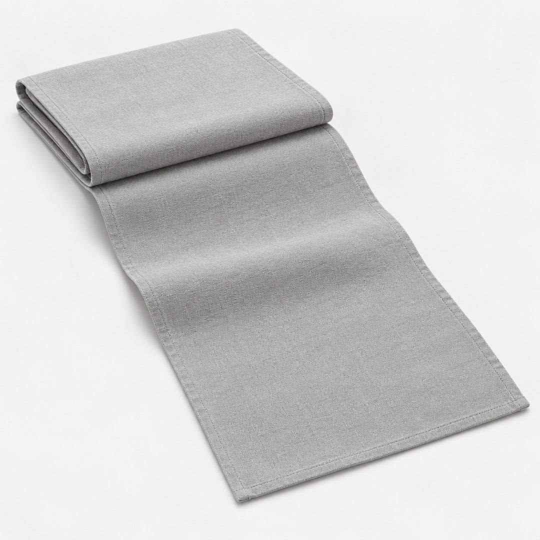 Light Gray cotton table runner with sewn edges, folded studio view; choose length separately.