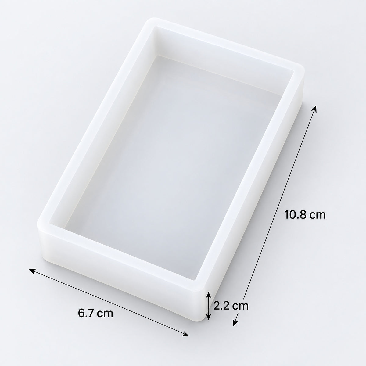 White rectangular tray or mold shown on a light gray background with dimension arrows and labels indicating 10.8 cm length, 6.