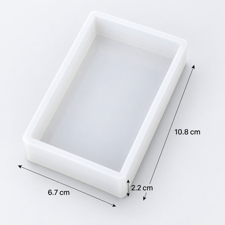 White rectangular tray or mold shown on a light gray background with dimension arrows and labels indicating 10.8 cm length, 6.