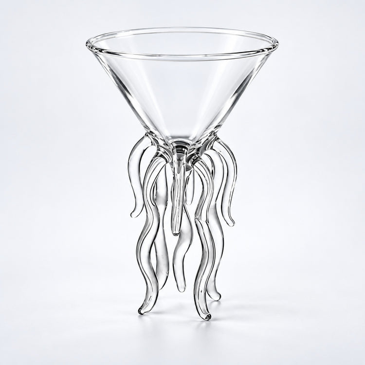 Empty 100 ml cocktail glass with wavy support legs.