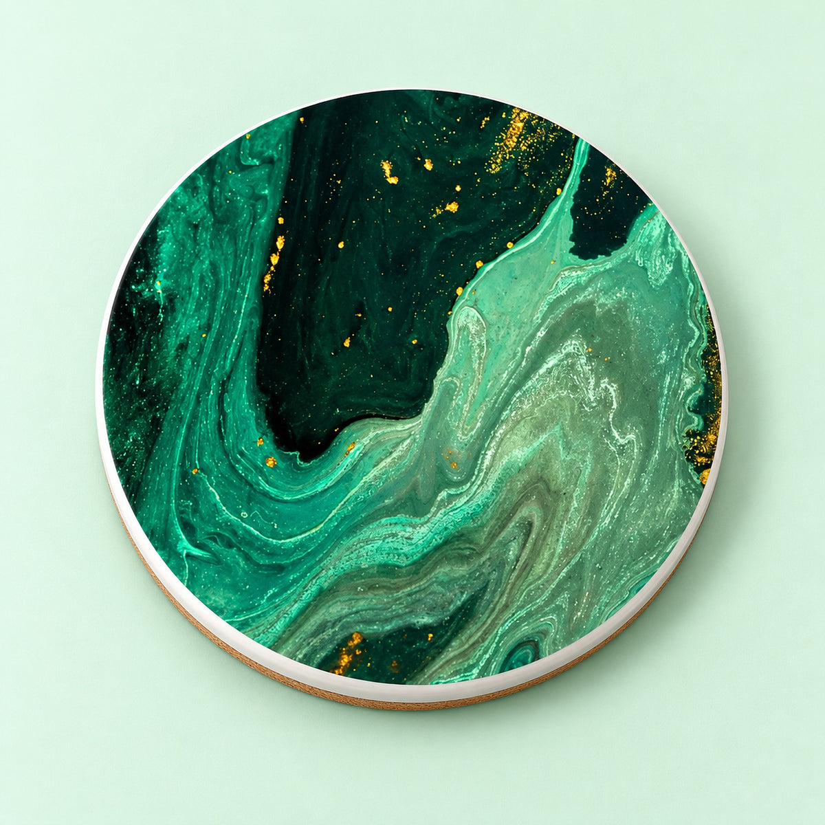 One emerald green and gold marble printed ceramic coaster on a light studio background.