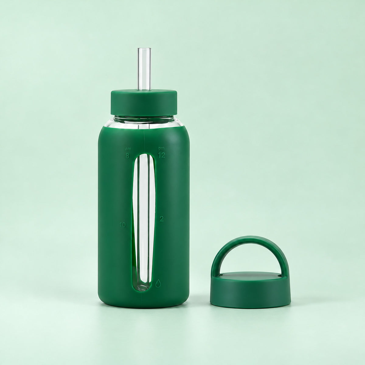 Green 800 ml glass bottle with silicone sleeve, wide straw and spare loop lid.