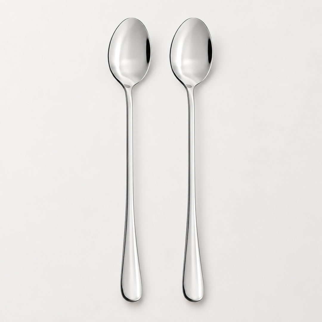 Two polished stainless steel spoons with long handles, shown vertically side-by-side on a clean, light gray background.