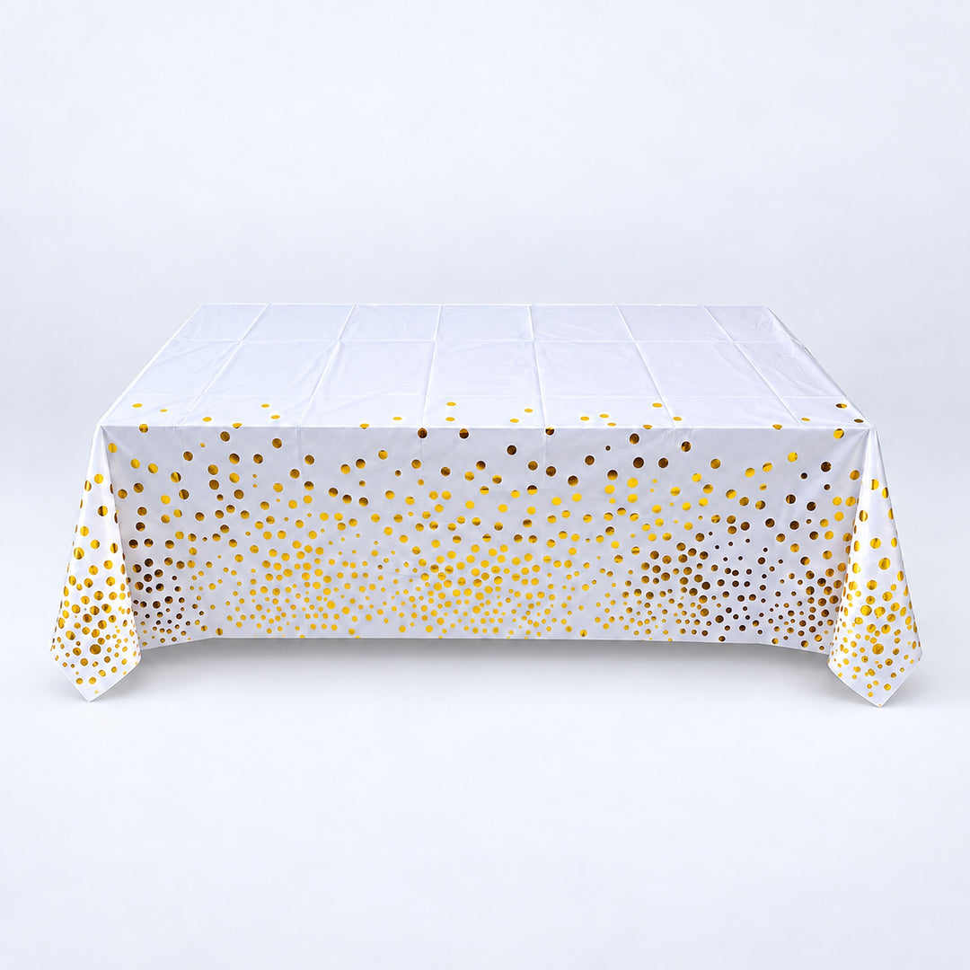 white with gold dots disposable plastic table cover style.