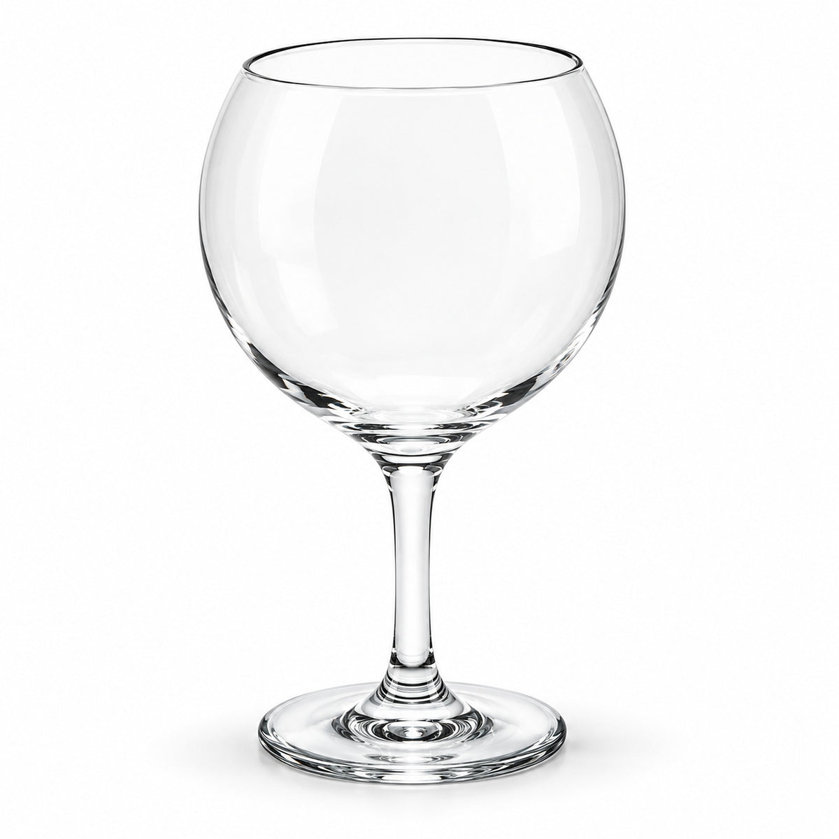 A clear glass coupe-style wine glass with a wide, rounded bowl, a slender stem, and a flat circular base, shown on a plain white background.