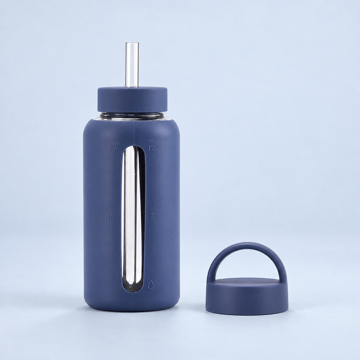 Indigo Blue 800 ml glass bottle with silicone sleeve, wide straw and spare loop lid.