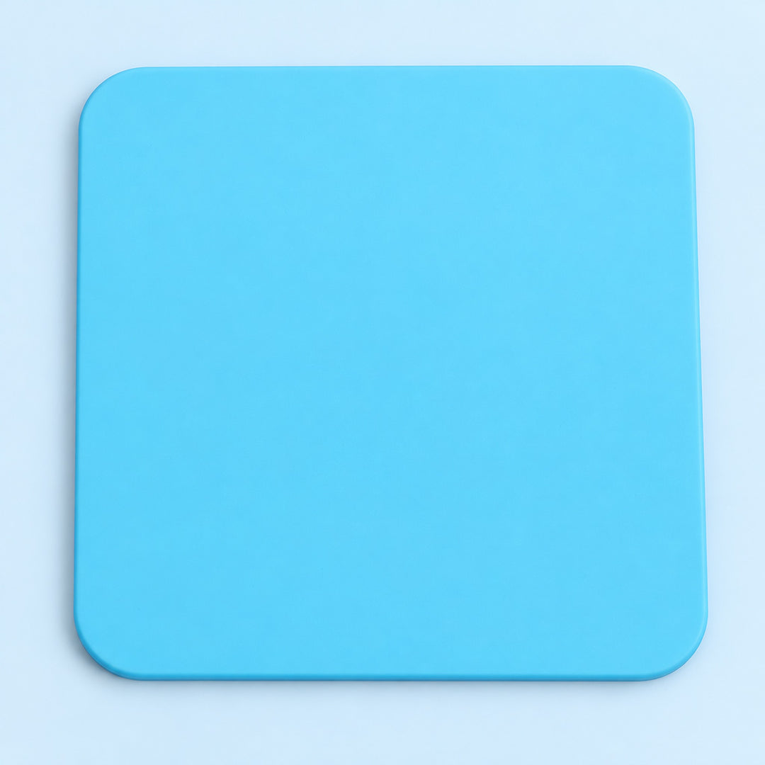 One light blue square silicone coaster, 10 x 10 cm.