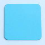 One light blue square silicone coaster, 10 x 10 cm.