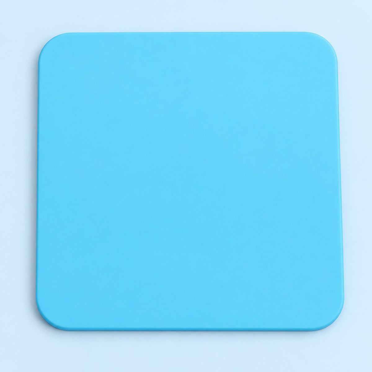 One light blue square silicone coaster, 10 x 10 cm.