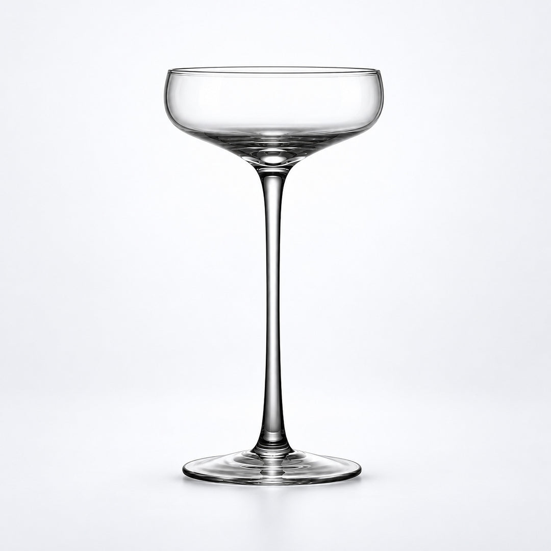 Empty 190 ml tall-stem coupe glass.