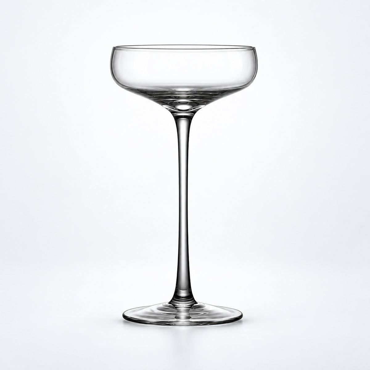 Empty 190 ml tall-stem coupe glass.