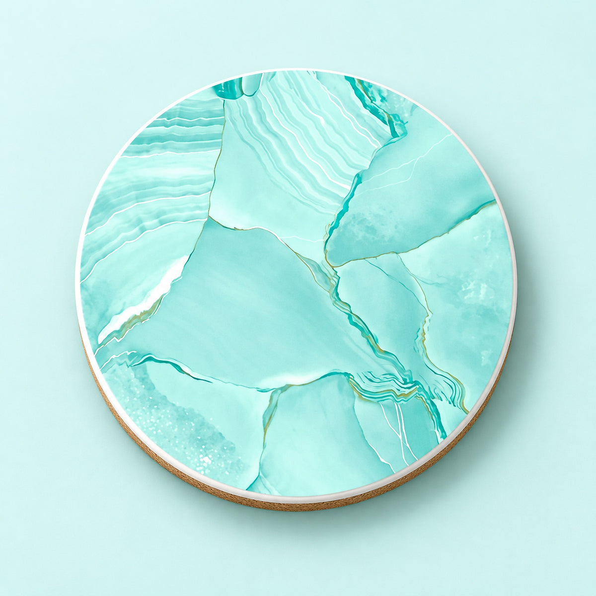 One aqua marble bands printed ceramic coaster on a light studio background.