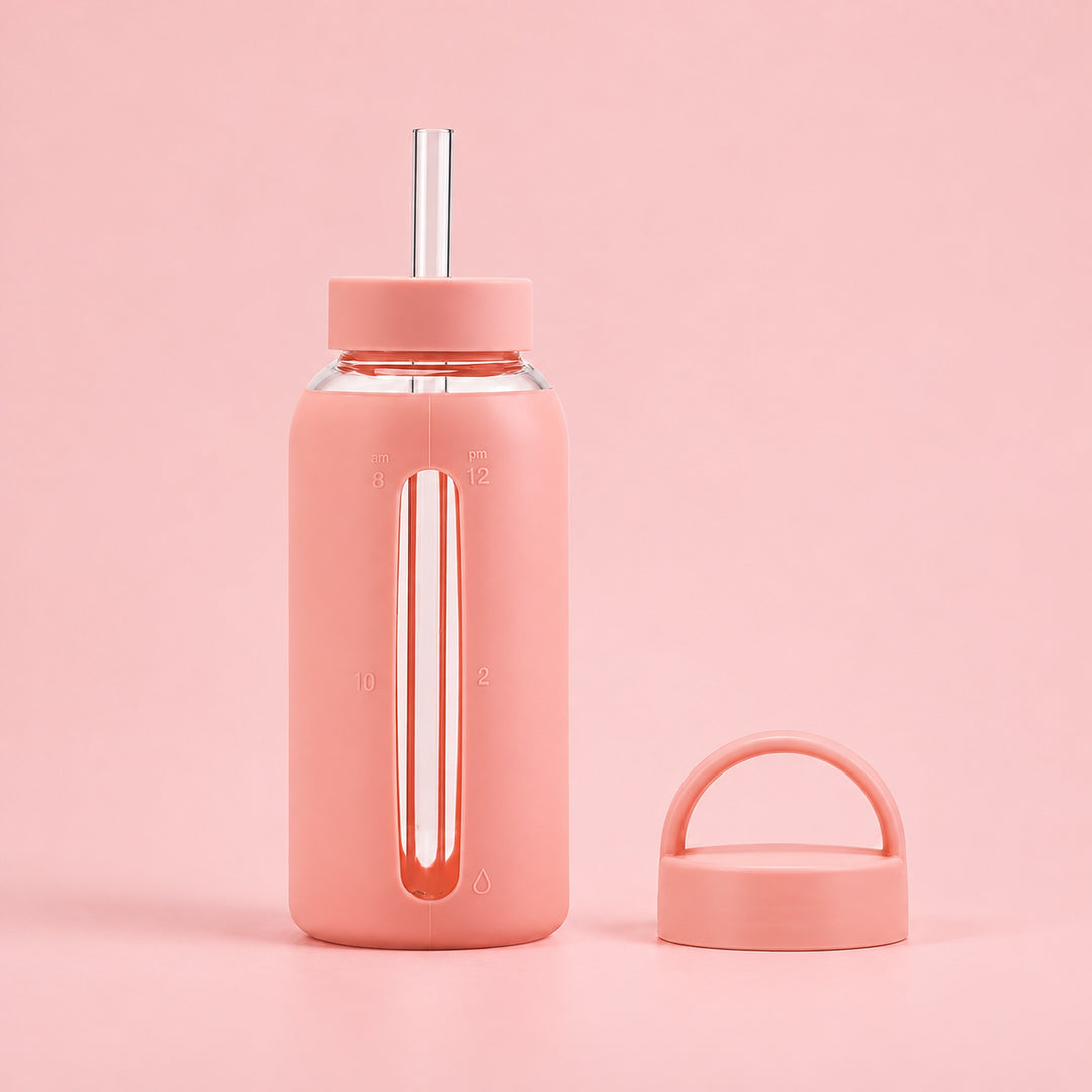 Light Pink 800 ml glass bottle with silicone sleeve, wide straw and spare loop lid.