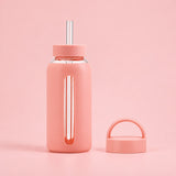 Light Pink 800 ml glass bottle with silicone sleeve, wide straw and spare loop lid.