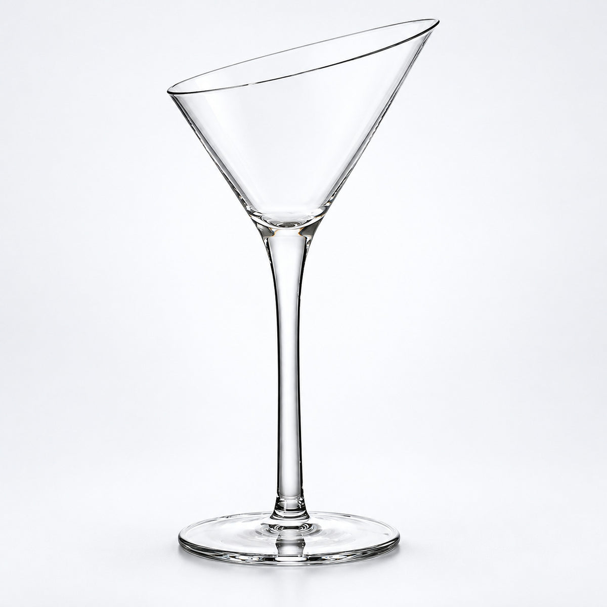 Empty 140 ml slanted-rim cocktail glass.