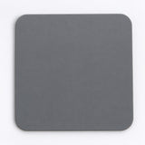 One gray square silicone coaster, 10 x 10 cm.