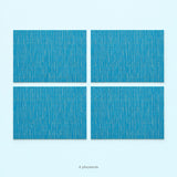 Blue woven vinyl placemats, 4-piece set, 30 by 45 cm each.