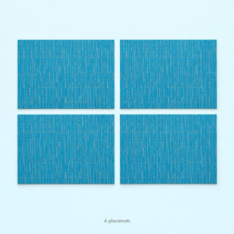 Blue woven vinyl placemats, 4-piece set, 30 by 45 cm each.