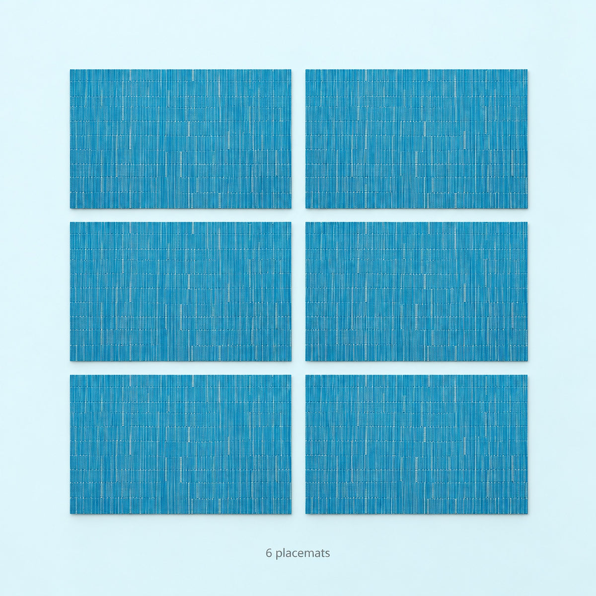 Blue woven vinyl placemats, 6-piece set, 30 by 45 cm each.