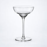Empty 140 ml tall-stem rounded coupe glass.