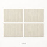 Cream woven vinyl placemats, 4-piece set, 30 by 45 cm each.