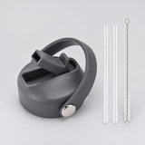 Gray replacement lid with two clear straws and a cleaning brush.