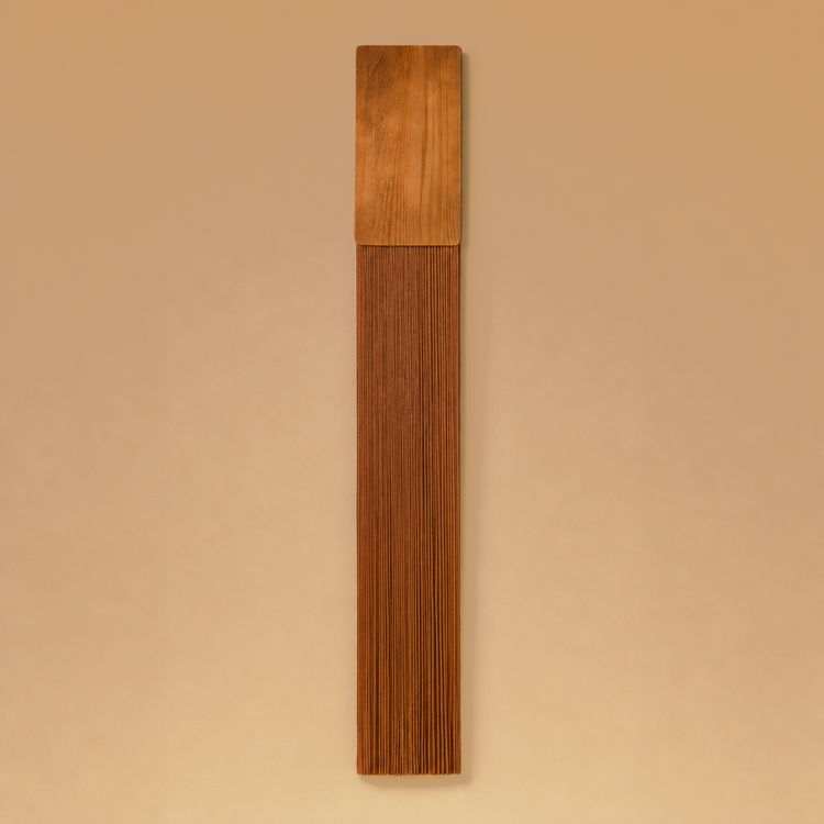 A minimalist wooden wall art piece featuring a rectangular top panel in a lighter honey finish and a long, narrow lower section with vertically aligned wood grain in a medium warm brown, shown against a solid beige background.